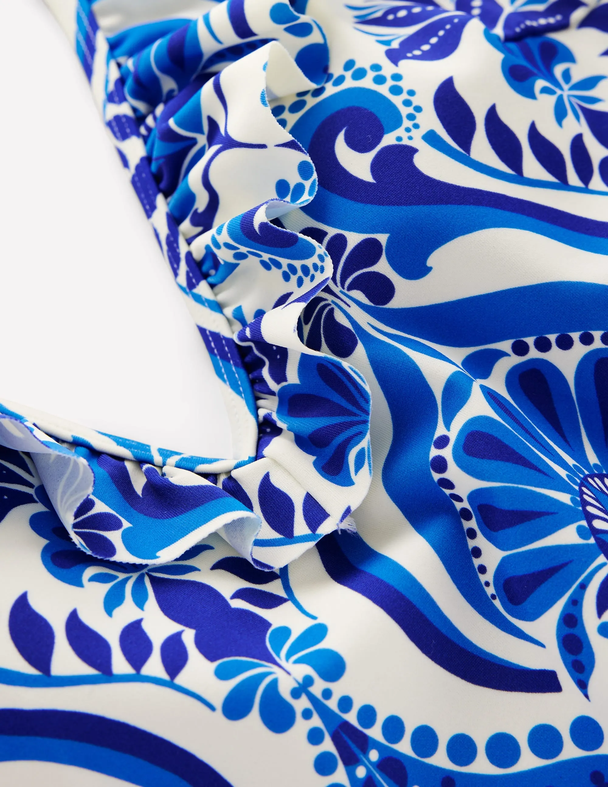 Evia Ruffle Swimsuit-Blue. Ornamental Floral